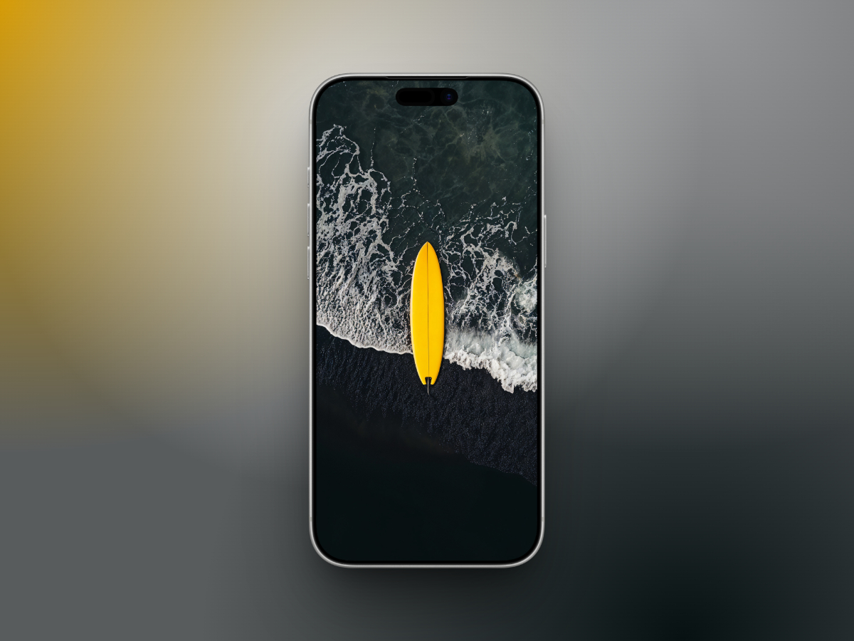 Yellow Surfboard on Black Shore